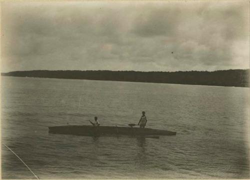 Men in outrigger canoe