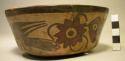 Polychrome pottery bowl with humming bird motif