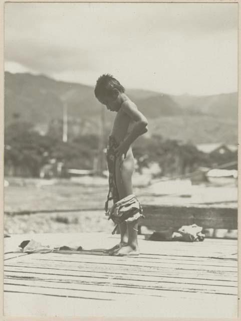 Boy on wooden platform