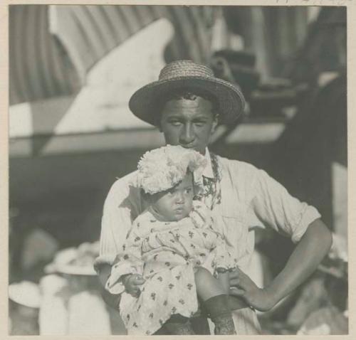 Man holding small child