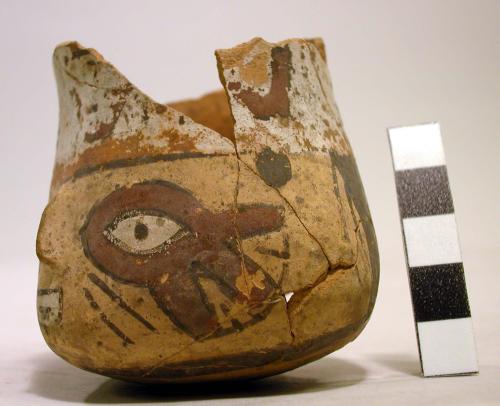 Small head vase, face with falcon eye markings
