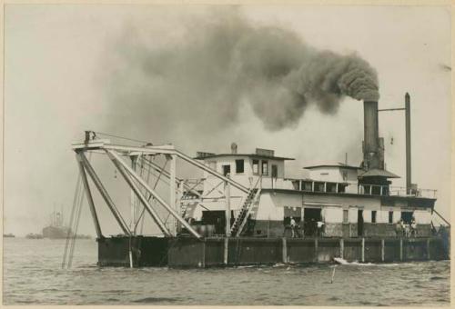 Dredge behind breakwater, Manila Bay