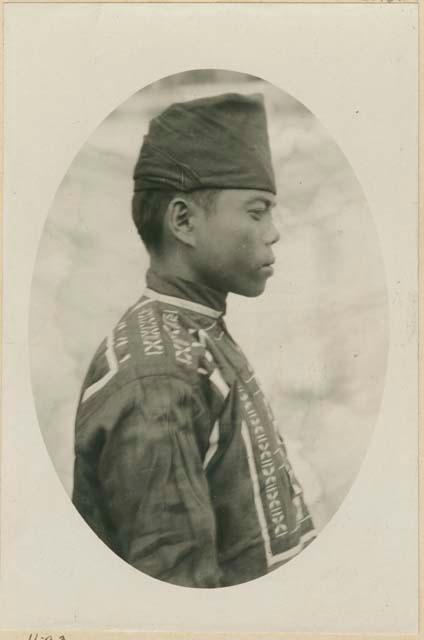 Profile of Bukidnon man posed in traditional dress