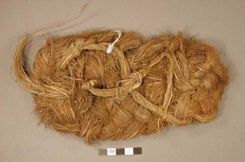 Woven fiber, probably a sandal fragment