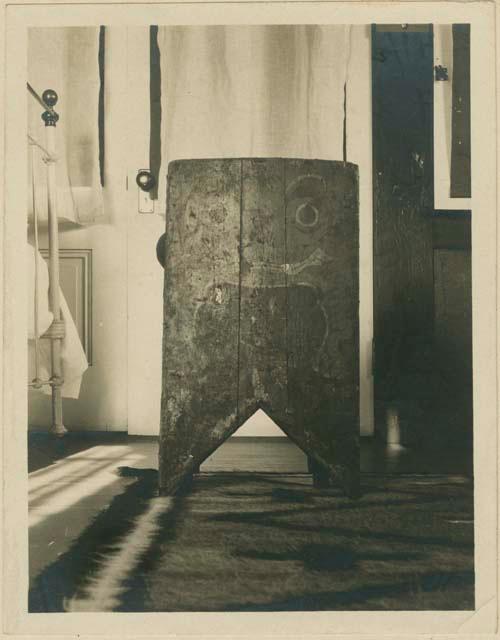 Wooden shield, covered and decorated in colors