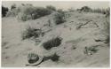 Play hogans and corrals on sand dune constructed by Navajo children