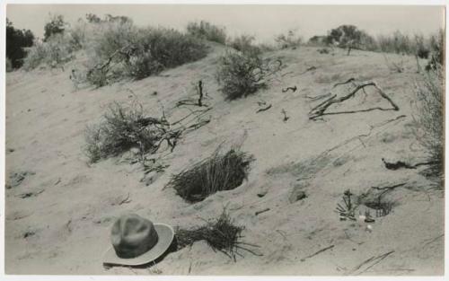 Play hogans and corrals on sand dune constructed by Navajo children