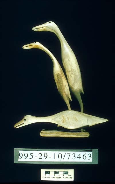 Antler carving of three elongated birds (B,C,D) on base (A)