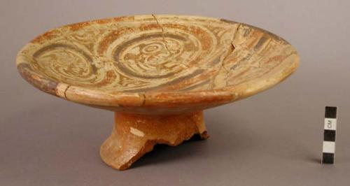 Polychrome pottery plate, annular base