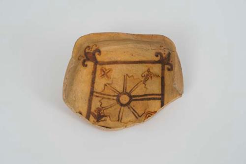 Ceramic partial bowl, square, brown on yellow interior, flowers and birds