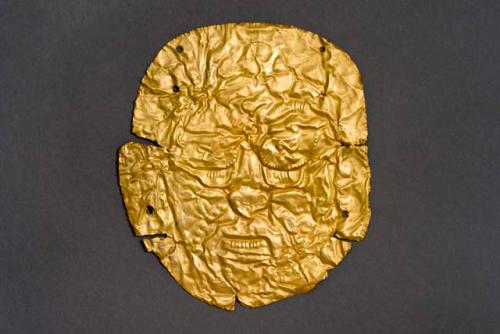 Gold small mask of human face