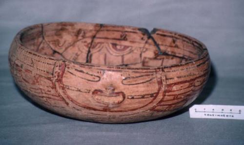 Earthen bowl painted, with face