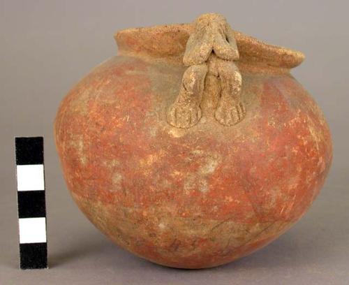 Pottery jar, with handle in shape of human figure, chipped rim