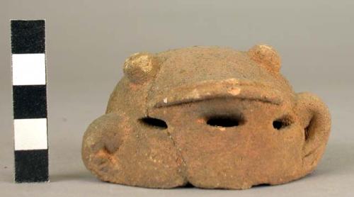 Pottery frog effigy applique for vessel.  Light brown, probably faded from red.