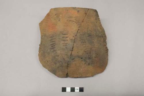 Archaeological, ceramic sherds, two rim and body sherds cross mended, linear designs.