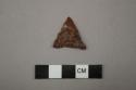 Archaeological, chipped stone, triangular point, red stone