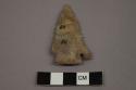 Archaeological, chipped stone, corner-notched projectile point, one shoulder missing