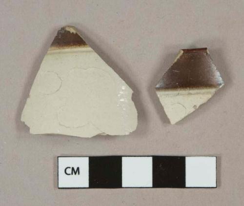 Cream and Dark brown salt glazed stoneware, likely bristol glaze, vessel body and rim fragments, light gray paste