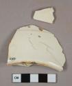 Undecorated white ironstone vessel body and base fragment