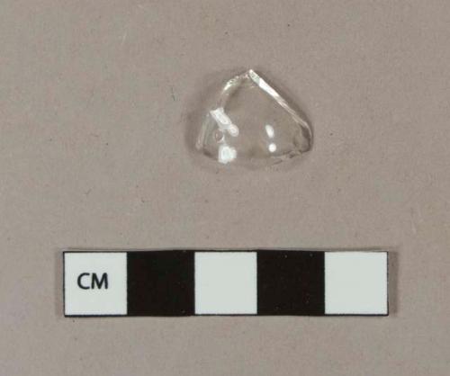 Colorless bottle glass fragment with molded dot