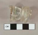 Colorless glass vessel fragments, likely stemware