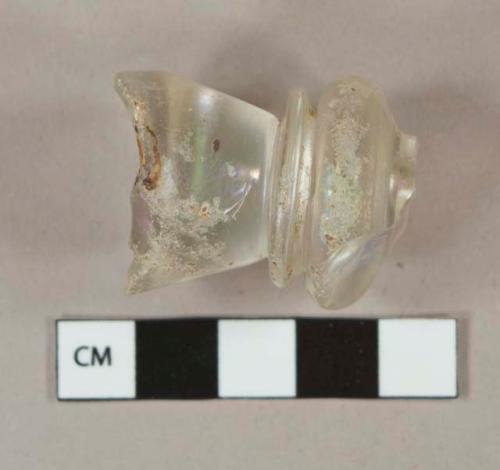 Colorless glass vessel fragments, likely stemware