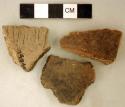Ceramic, earthenware body sherds, incised, punctate, and cord-impressed; two sherds sampled for thin sections
