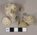 Mortar fragments, 5 natural stone pebbles