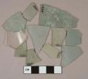 Light aqua flat glass fragments, 1 colorless glass vessel body fragment