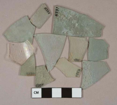 Light aqua flat glass fragments, 1 colorless glass vessel body fragment