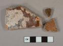 Brown slip-glazed redware vessel body fragments, undecorated
