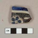 Gray salt glazed stoneware vessel body fragment, cobalt and manganese decorated, molded decoration, gray paste