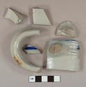 Gray salt glazed stoneware vessel body, base, rim, and handle fragments, gray paste, cobalt decorated