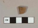 Brown lustrous salt glaze stoneware vessel body fragment, gray paste, undecorated, likely nottingham type