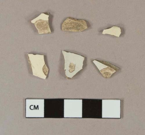 Undecorated creamware body sherds; undecorated pearlware body sherds