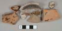 Reddish brown slip-glazed redware vessel body, base, and rim fragment, red paste