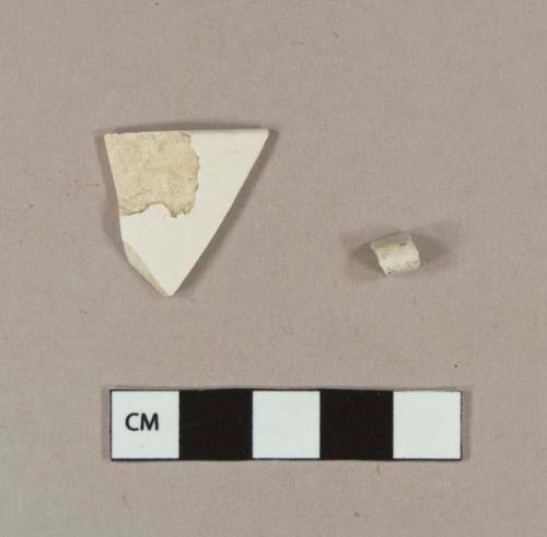 Undecorated whiteware rim sherds; one sherd crossmends with undecorated whiteware body sherds