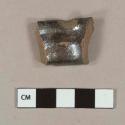 Undecorated lead glazed redware handle sherd