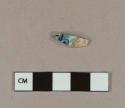 Blue-tinted, black transfer printed whiteware body sherd