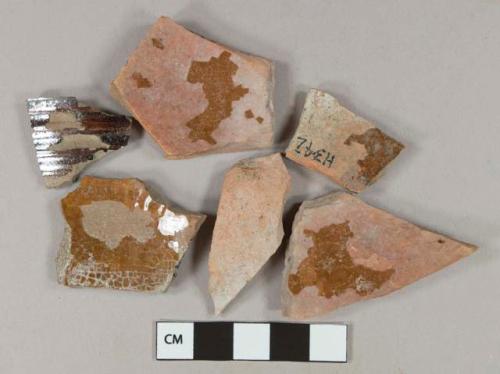 Lustrous brown lead glazed redware vessel body fragments