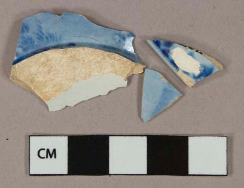 Blue on white flow blue transferprinted earthenware vessel body fragments, white or light buff paste