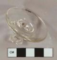 Colorless glass stemware base fragment