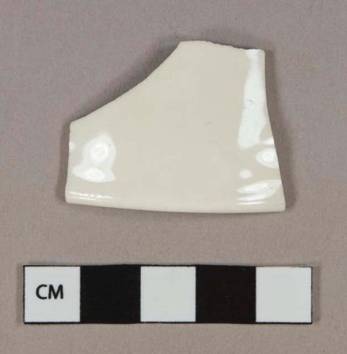 White undecorated lead glazed porcelain vessel rim fragment, white paste