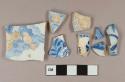 Blue on white transferprinted pearlware vessel body and rim fragments, white paste