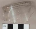 Colorless glass vessel base fragment, likely tumbler