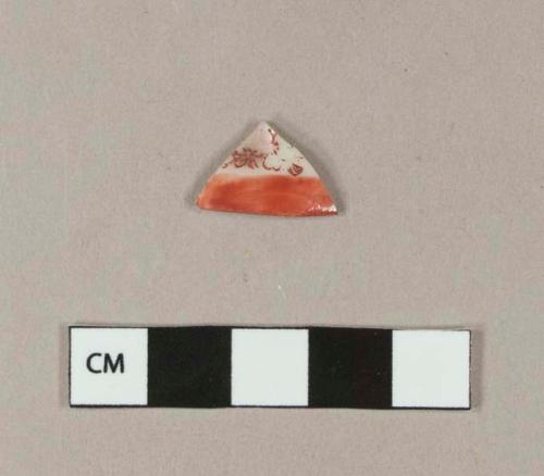 Red painted underglaze, red painted overglaze porcelain rim sherd