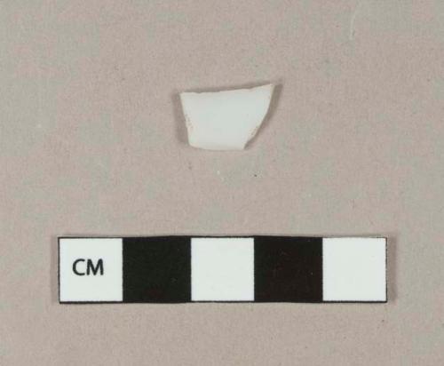 Milk white bottle glass fragment