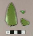 Molded green bottle glass fragments