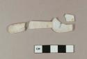 Plastic spoon fragments; three fragments crossmend