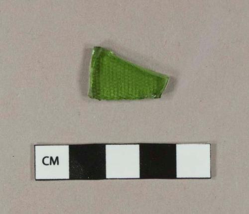 Molded green bottle glass fragment